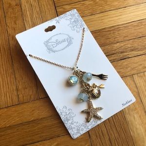 The Little Mermaid multi-charm gold tone necklace